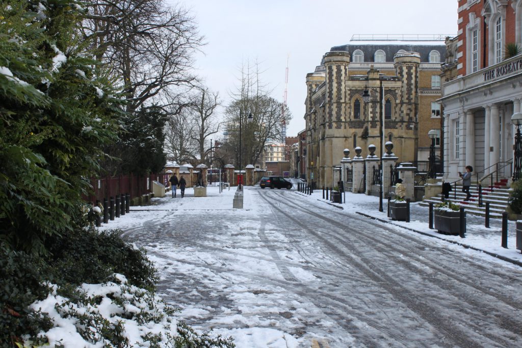 The snowy streets of Reading. The area is a small side street next to Forbury Gardens